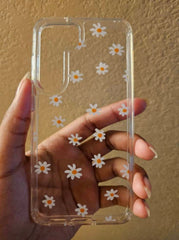 Elevate your device with our Minimal Daisy Clear Customise Phone Case, a perfect fusion of simplicity and elegance. Designed for all major phone models, simply specify your device model below.